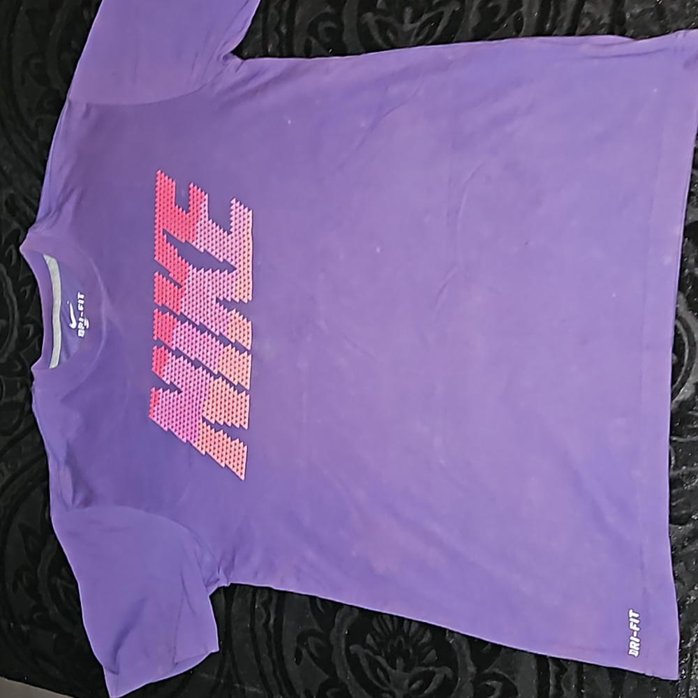 Womens Nike Dri-Fit t-shirt, size medium, shirts purple/Nike in orange pinkish.